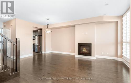 6 - 70 Littlecreek Road, Mississauga, ON - Indoor Photo Showing Living Room With Fireplace
