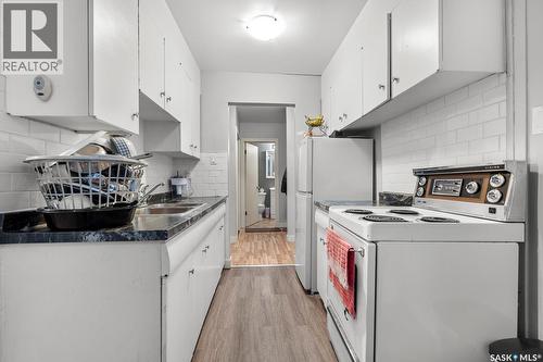 1560 Alexandra Street, Regina, SK - Indoor Photo Showing Kitchen With Double Sink