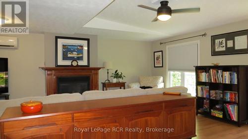 164 Edward Street, Saugeen Shores, ON - Indoor Photo Showing Bedroom With Fireplace