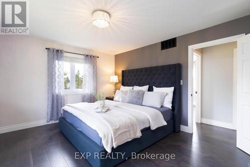 Main Floor Primary Bedroom - 8 Pardo Court, Scugog, ON - Indoor Photo Showing Bedroom