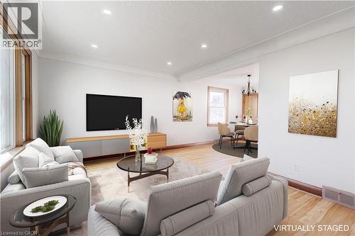 Staged Living Room - 662 Harriet Street Unit# Upper, Welland, ON - Indoor Photo Showing Living Room