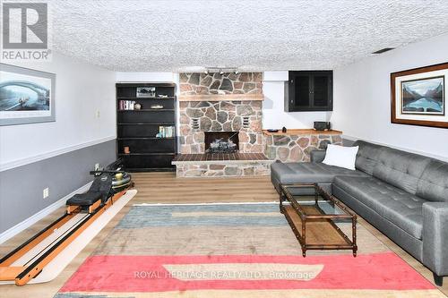 273 Maxwell Avenue W, Peterborough (Ashburnham Ward 4), ON - Indoor Photo Showing Living Room With Fireplace