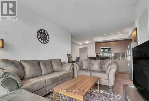 1917 - 2550 Simcoe Street N, Oshawa, ON - Indoor Photo Showing Living Room