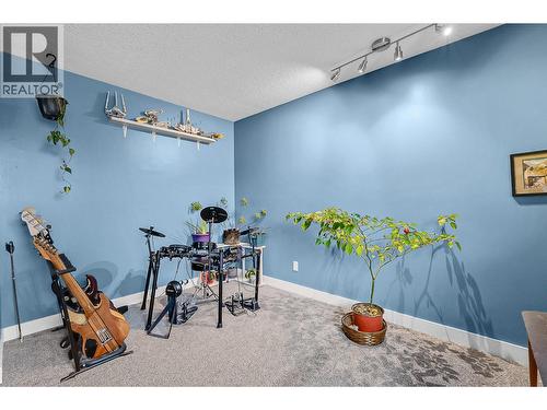 Primary bedroom now a music room - 715 Leathead Road Unit# 142, Kelowna, BC - Indoor