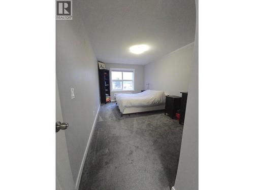 1479 Glenmore Road N Unit# 308, Kelowna, BC - Indoor Photo Showing Bedroom