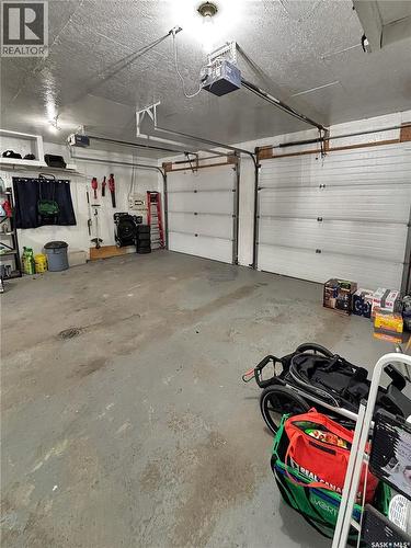 302 Persson Street, Stockholm, SK - Indoor Photo Showing Garage