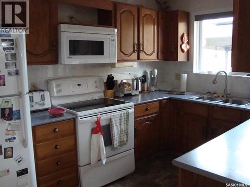111 2Nd Street E, Kyle, SK - Indoor Photo Showing Kitchen With Double Sink