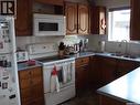 111 2Nd Street E, Kyle, SK  - Indoor Photo Showing Kitchen With Double Sink 