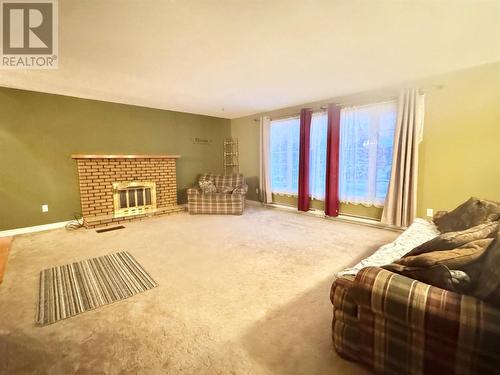 21 Main Street, Embree, NL - Indoor With Fireplace