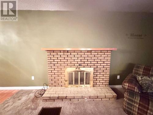 21 Main Street, Embree, NL - Indoor With Fireplace