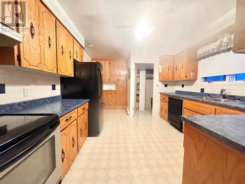 21 Main Street, Embree, NL - Indoor Photo Showing Kitchen With Double Sink