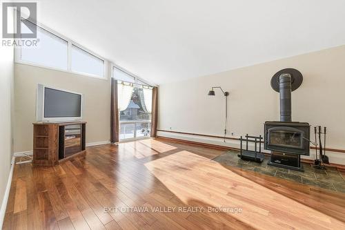 3 Newton Crescent, Deep River, ON - Indoor Photo Showing Living Room With Fireplace