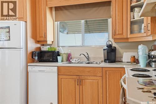 23 John East Avenue, Saskatoon, SK - Indoor Photo Showing Kitchen With Double Sink