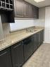 508 - 75 Ellen Street, Barrie, ON  - Indoor Photo Showing Kitchen With Double Sink 