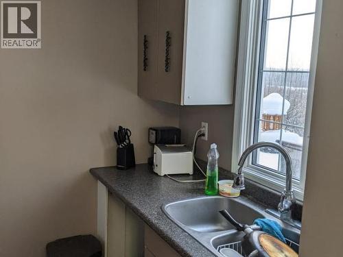 148 & 150 Dawson Drive, Faro, YT - Indoor Photo Showing Other Room