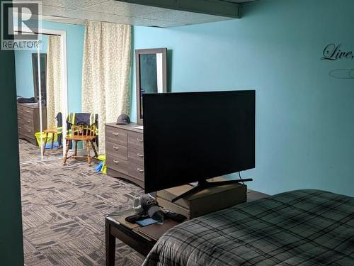 148 & 150 Dawson Drive, Faro, YT - Indoor Photo Showing Bedroom