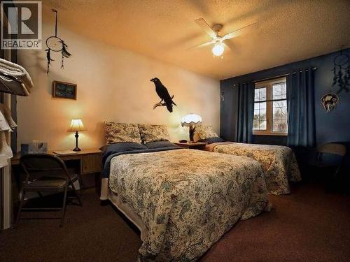 148 & 150 Dawson Drive, Faro, YT - Indoor Photo Showing Bedroom