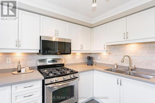66 John W Taylor Avenue, New Tecumseth, ON - Indoor Photo Showing Kitchen With Double Sink