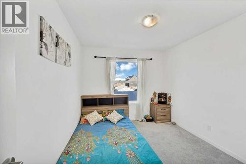 117 South Point  Sw, Airdrie, AB - Indoor Photo Showing Bedroom