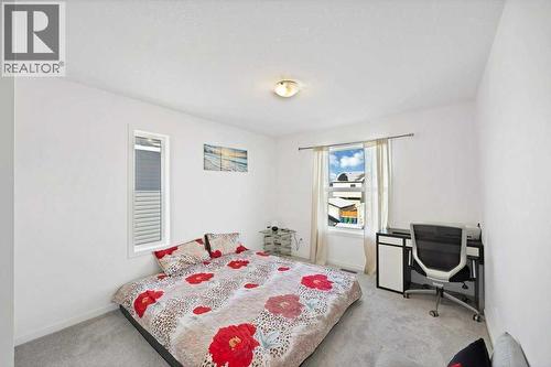 117 South Point  Sw, Airdrie, AB - Indoor Photo Showing Bedroom