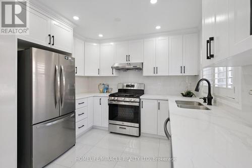 7562 Black Walnut Trail, Mississauga, ON - Indoor Photo Showing Kitchen With Stainless Steel Kitchen With Double Sink With Upgraded Kitchen