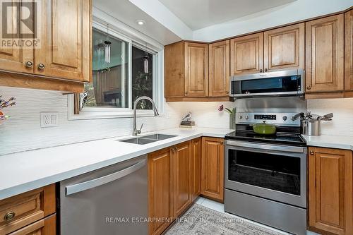 5 - 1580 Kerns Road, Burlington, ON - Indoor Photo Showing Kitchen With Double Sink