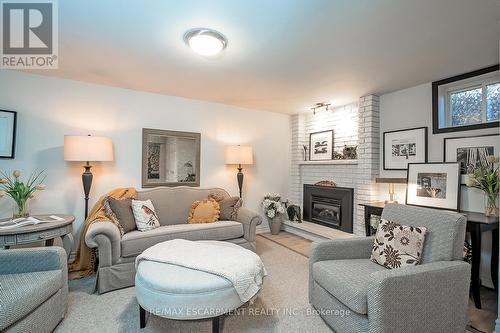 5 - 1580 Kerns Road, Burlington, ON - Indoor Photo Showing Living Room With Fireplace