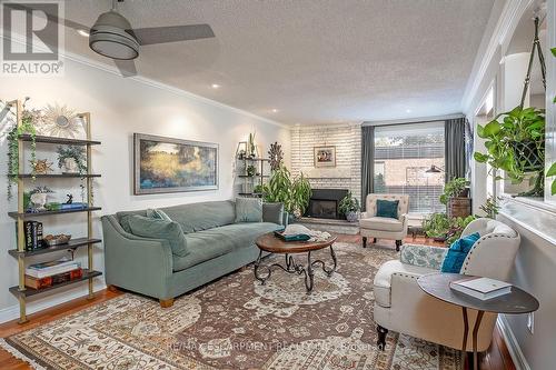 5 - 1580 Kerns Road, Burlington, ON - Indoor Photo Showing Living Room With Fireplace