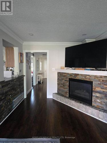 35 Jay Street, Brampton, ON - Indoor Photo Showing Living Room With Fireplace