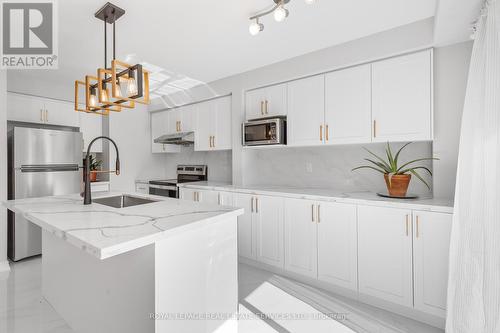 63 - 5230 Glen Erin Drive, Mississauga, ON - Indoor Photo Showing Kitchen With Upgraded Kitchen