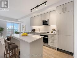 2705 - 286 MAIN STREET  Toronto, ON M4C 0B3