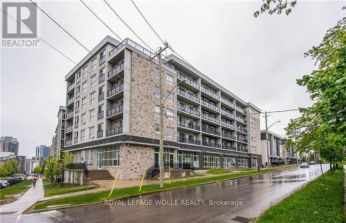609F - 275 Larch Street, Waterloo, ON - Outdoor With Balcony With Facade