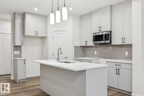 309 26 St Sw, Edmonton, AB - Indoor Photo Showing Kitchen With Upgraded Kitchen