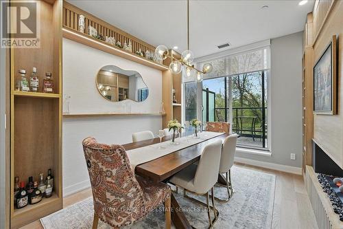 Formal Dining Area with Built-In Cabinetry - 108 - 2489 Taunton Road, Oakville, ON - Indoor Photo Showing Dining Room