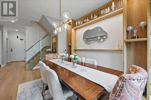 Formal Dining Area with Built-In Cabinetry - 108 - 2489 Taunton Road, Oakville, ON - Indoor Photo Showing Dining Room