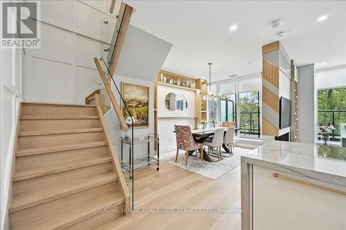 Showpiece Staircase Enhanced with Glass Panels - 108 - 2489 Taunton Road, Oakville, ON - Indoor Photo Showing Other Room