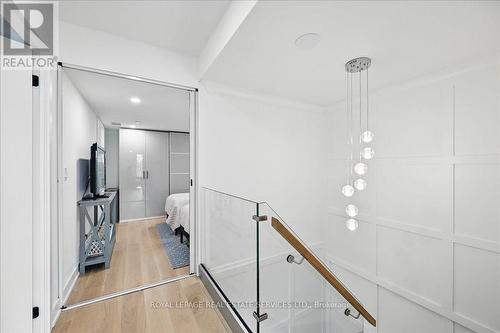 Rich Oak Hardwood Flooring Extends Throughout - 108 - 2489 Taunton Road, Oakville, ON - Indoor Photo Showing Other Room