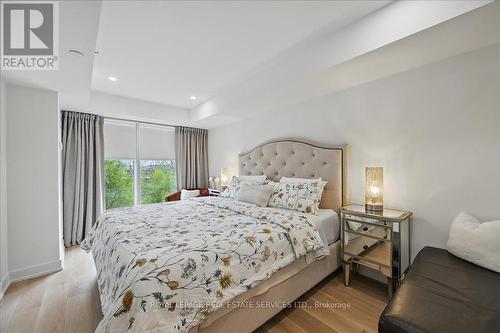 Primary Bedroom Offers a Walk-In Closet - 108 - 2489 Taunton Road, Oakville, ON - Indoor Photo Showing Bedroom