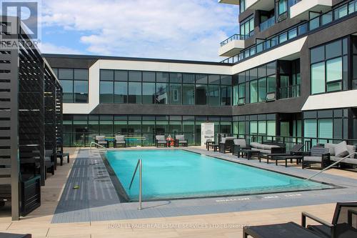 Residents Enjoy an Array of Resort-Like Amenities - 108 - 2489 Taunton Road, Oakville, ON - Outdoor With In Ground Pool