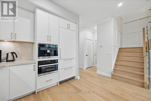 Gourmet Kitchen Showcases Premium Miele Appliances - 108 - 2489 Taunton Road, Oakville, ON - Indoor