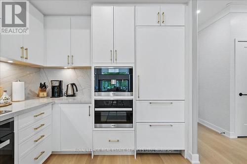 Gourmet Kitchen Showcases Premium Miele Appliances - 108 - 2489 Taunton Road, Oakville, ON - Indoor Photo Showing Kitchen