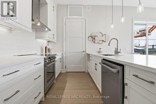 Model Suite 101 - 204 - 2 Arbourvale Common, St. Catharines (Glendale/Glenridge), ON - Indoor Photo Showing Kitchen With Upgraded Kitchen