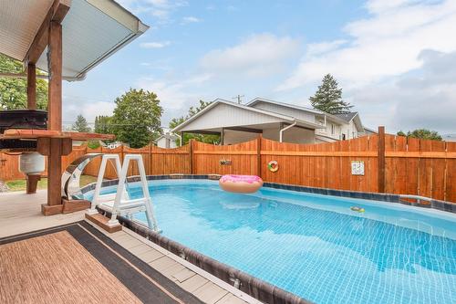 280 Mugford Road, Kelowna, BC - Outdoor With Above Ground Pool With Backyard