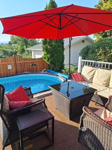 280 Mugford Road, Kelowna, BC - Outdoor With Above Ground Pool With Deck Patio Veranda