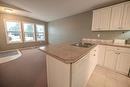 4866 Emerald Avenue, Canal Flats, BC  - Indoor Photo Showing Kitchen With Double Sink 