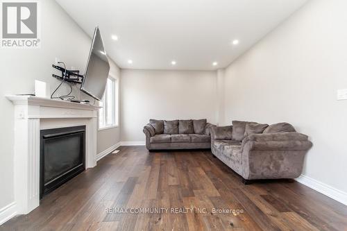 24 Raithby Crescent, Ajax, ON - Indoor Photo Showing Living Room With Fireplace