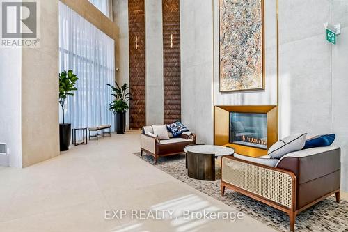 1708 - 1000 Portage Parkway, Vaughan, ON - Indoor Photo Showing Other Room With Fireplace