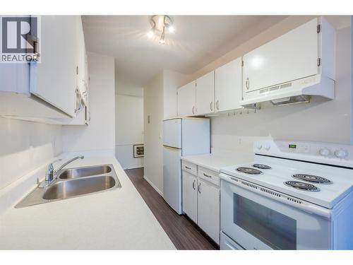 198 Roy Avenue Unit# 204, Penticton, BC - Indoor Photo Showing Kitchen With Double Sink