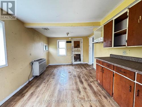 243 Hwy. #28 Highway, Addington Highlands (Addington Highlands), ON - Indoor Photo Showing Other Room With Fireplace