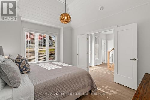 Main floor primary suite - 15 - 2054 Peninsula Road, Muskoka Lakes (Medora), ON - Indoor Photo Showing Bedroom